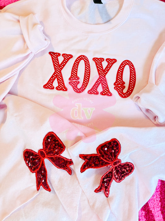 Light Pink XOXO applique sweatshirt with sparkle side bows