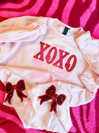 Light Pink XOXO applique sweatshirt with sparkle side bows