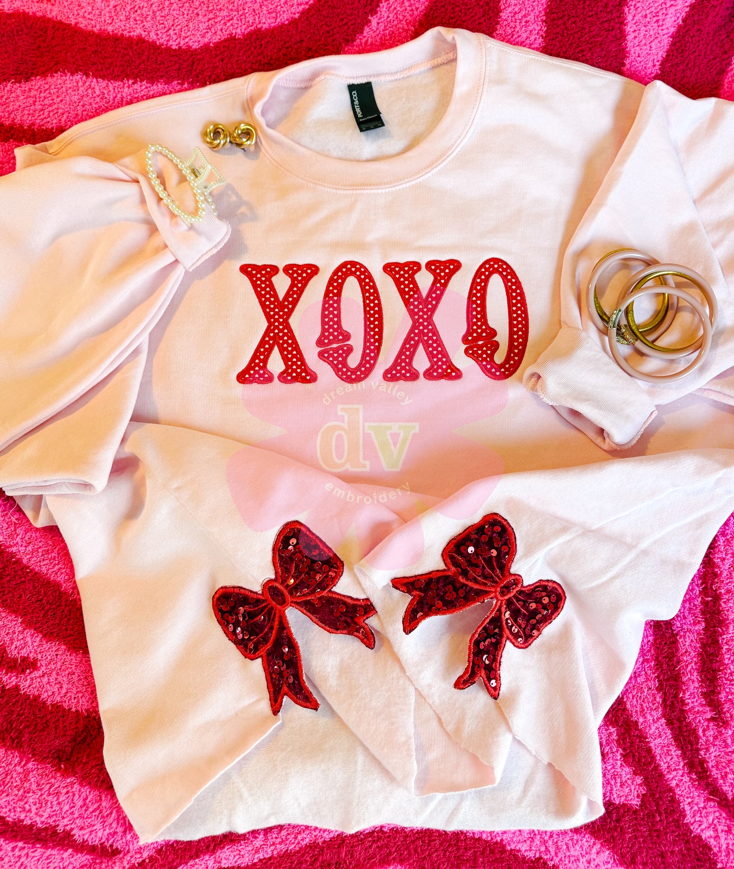 Light Pink XOXO applique sweatshirt with sparkle side bows